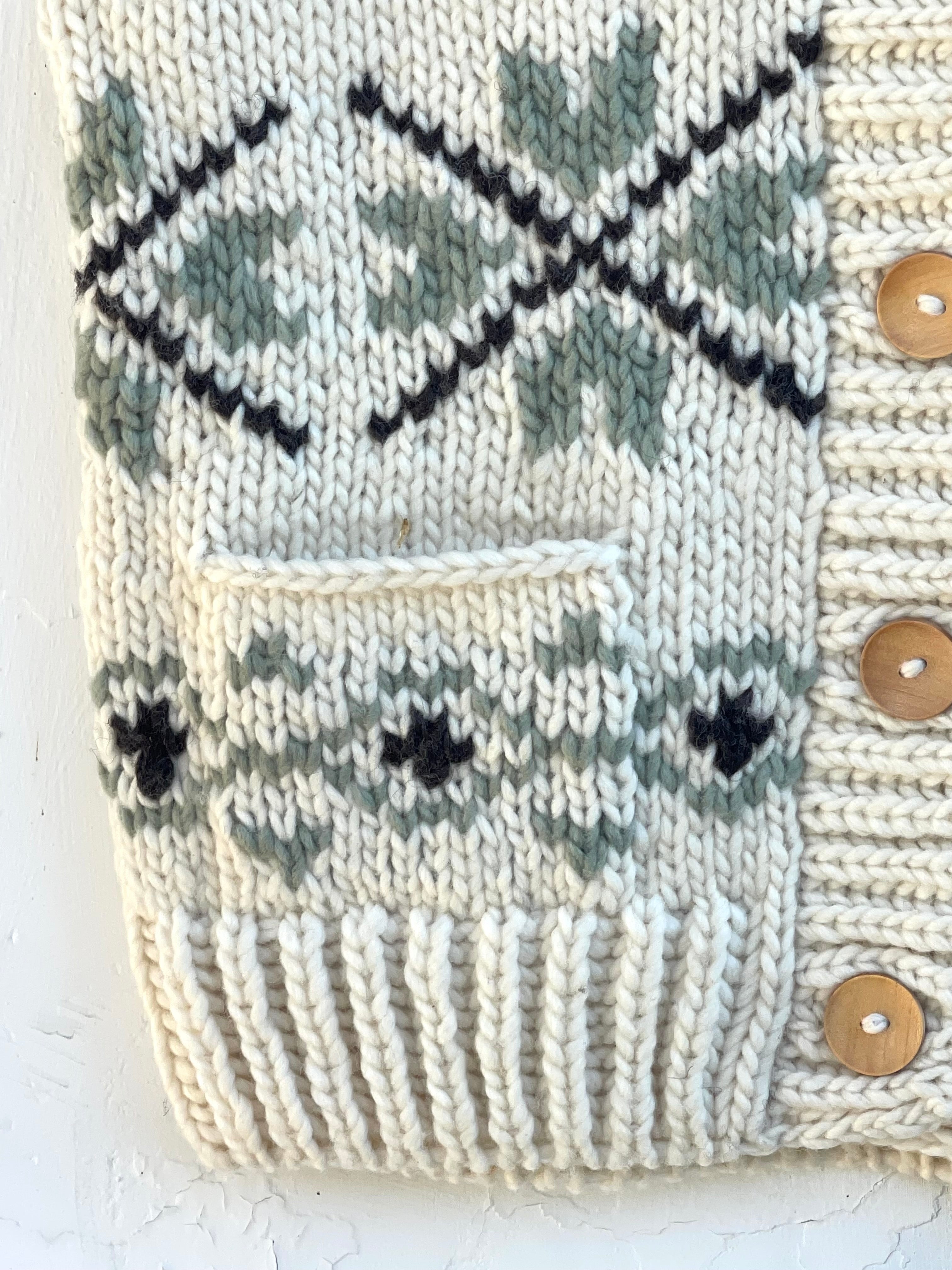 Håndstrikket vest - White